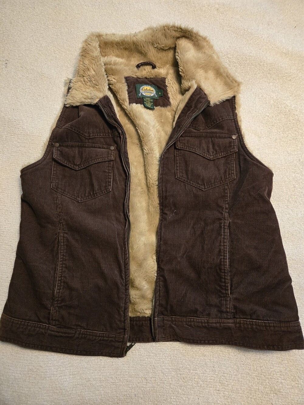 Cabela's brown corduroy faux-fur-lined zip vest featuring a plush fold-down coll